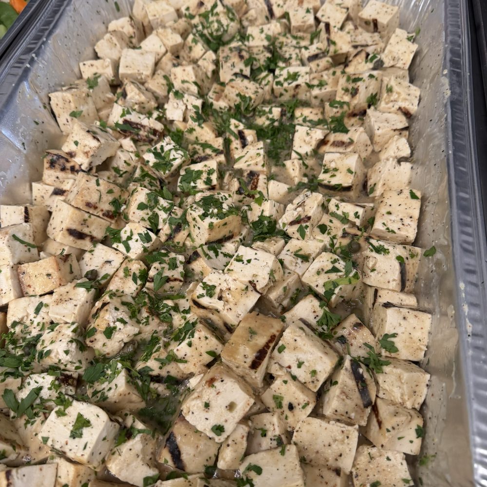 Marinated herbed tofu, the plant-based main on a corporate catering menu